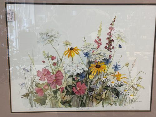 Watercolor print wildflowers “in the wild” by Lyn Snow. Gold metal frame, glass encased 24x30